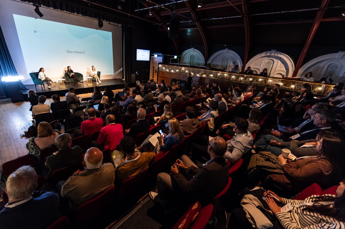A panel on stage at an Audiencers Festival.